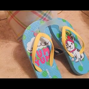 Disney T-shirt small, and Old Navy flip flops 5-6